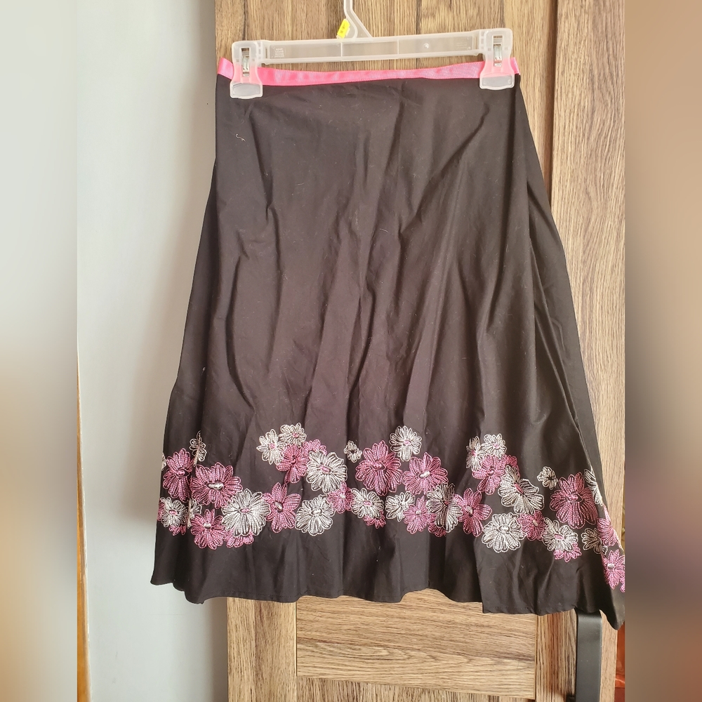 Black skirt with pink and white embroidery flowers